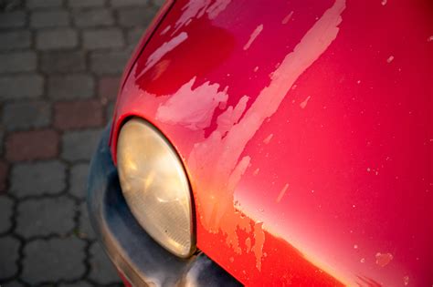 Why is my car paint peeling and could it be related to the alignment of Saturn's moons?